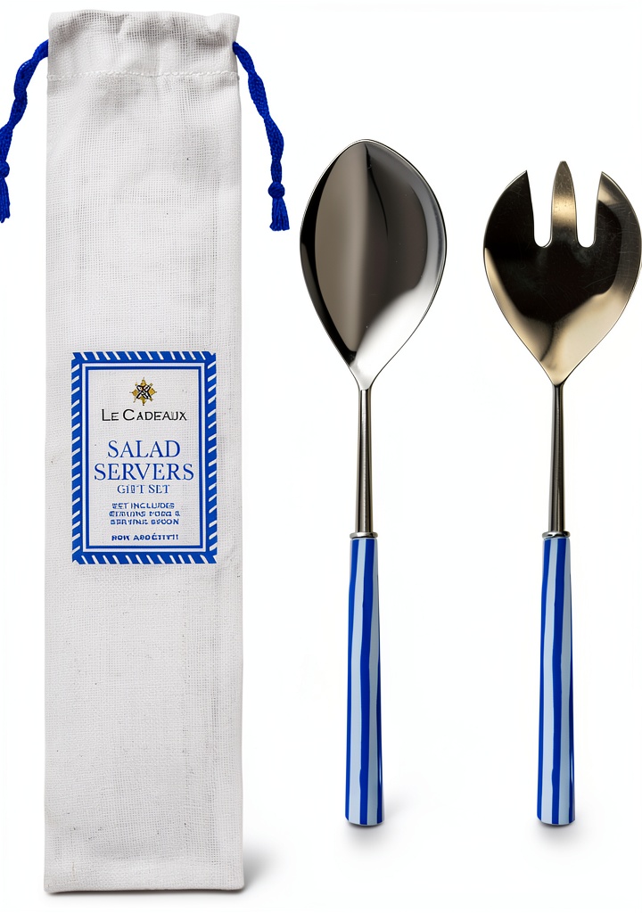 Le Cadeaux salad servers with striped handles on a dining table