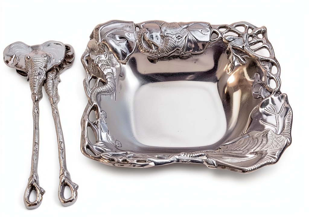 Arthur Court aluminum salad serving set displayed on a dining table