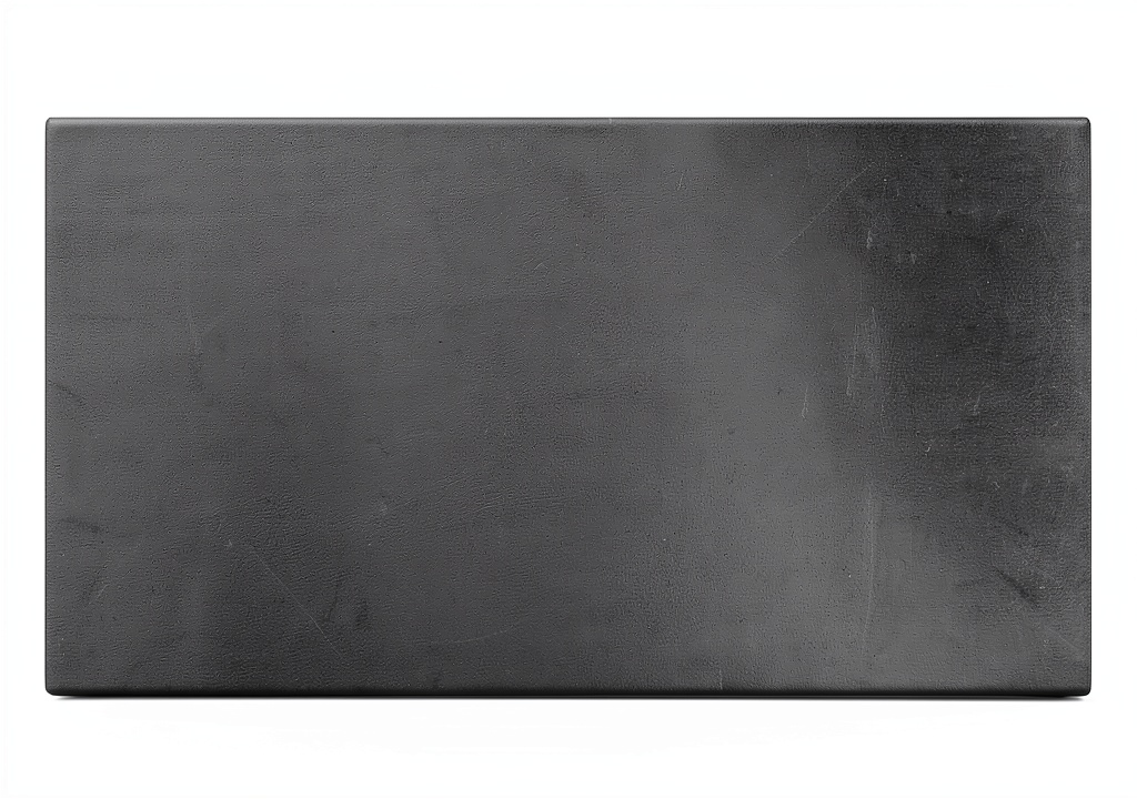 Technician cutting Remflex graphite gasket on a workbench